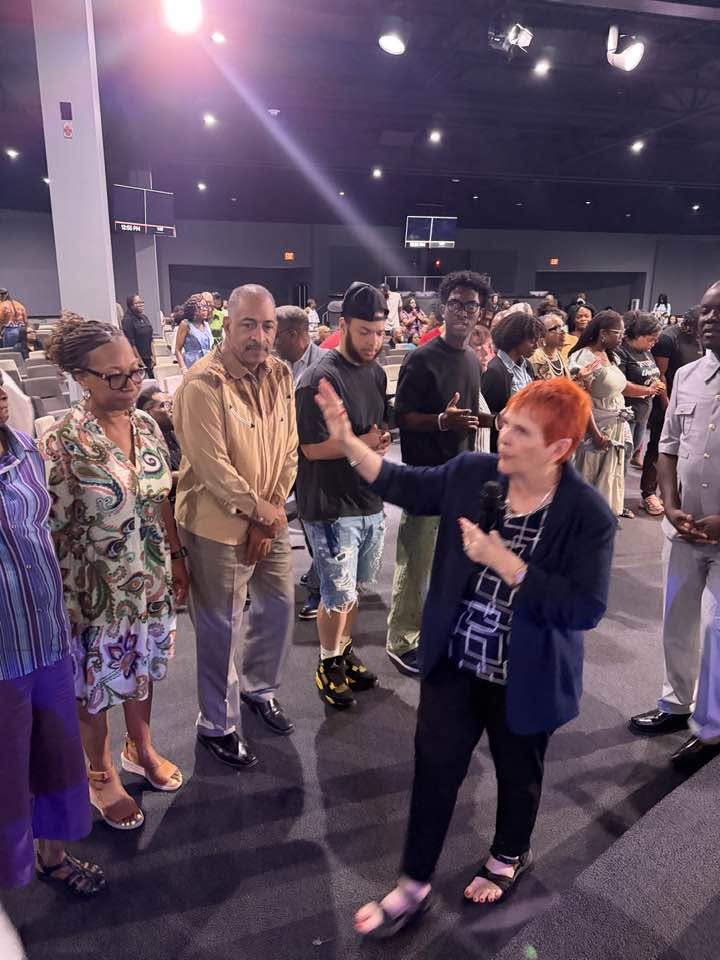Sharon Parkes ministering among people at church